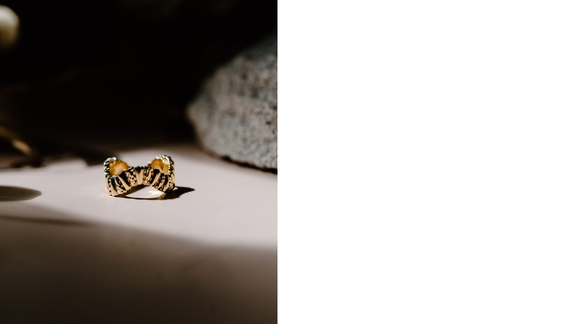 Personality rings on green stone with flower petals.
