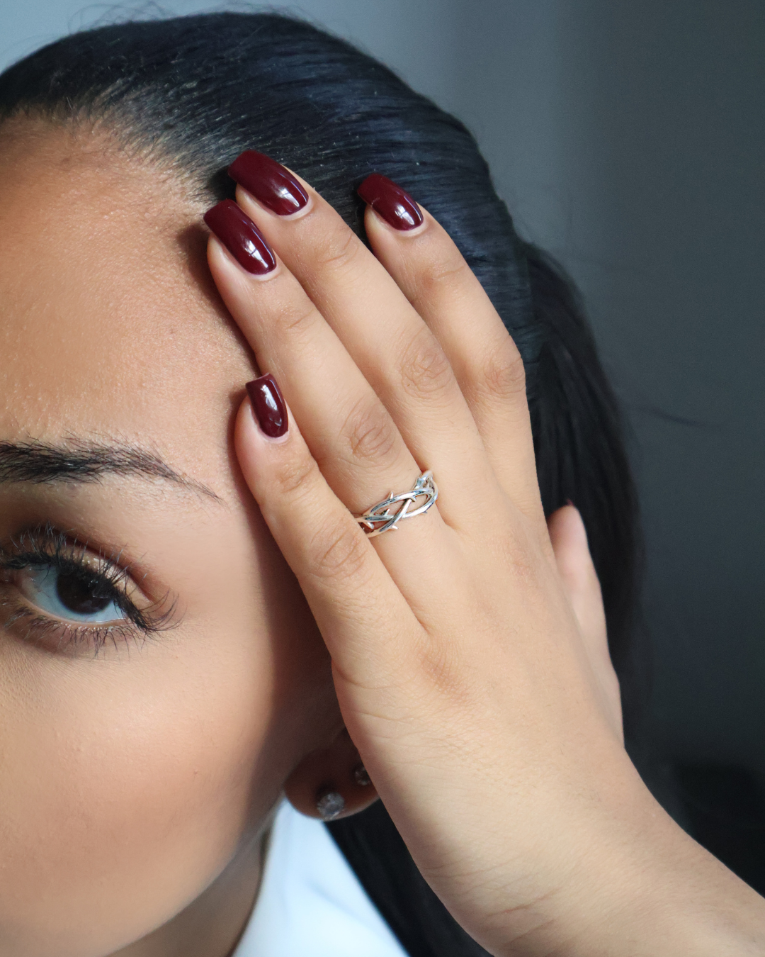 woman wearing silver ring