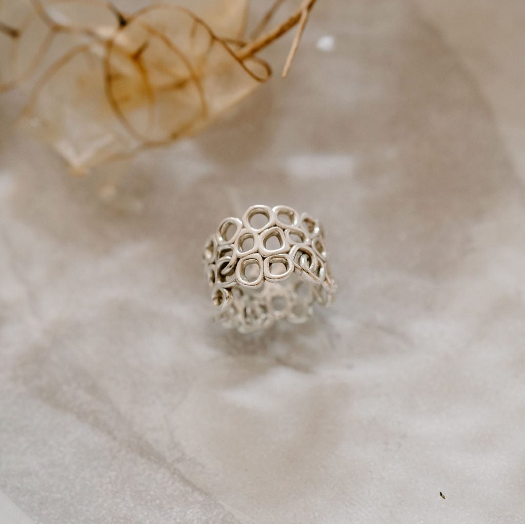 Ring inspired by inner beauty floating on water.