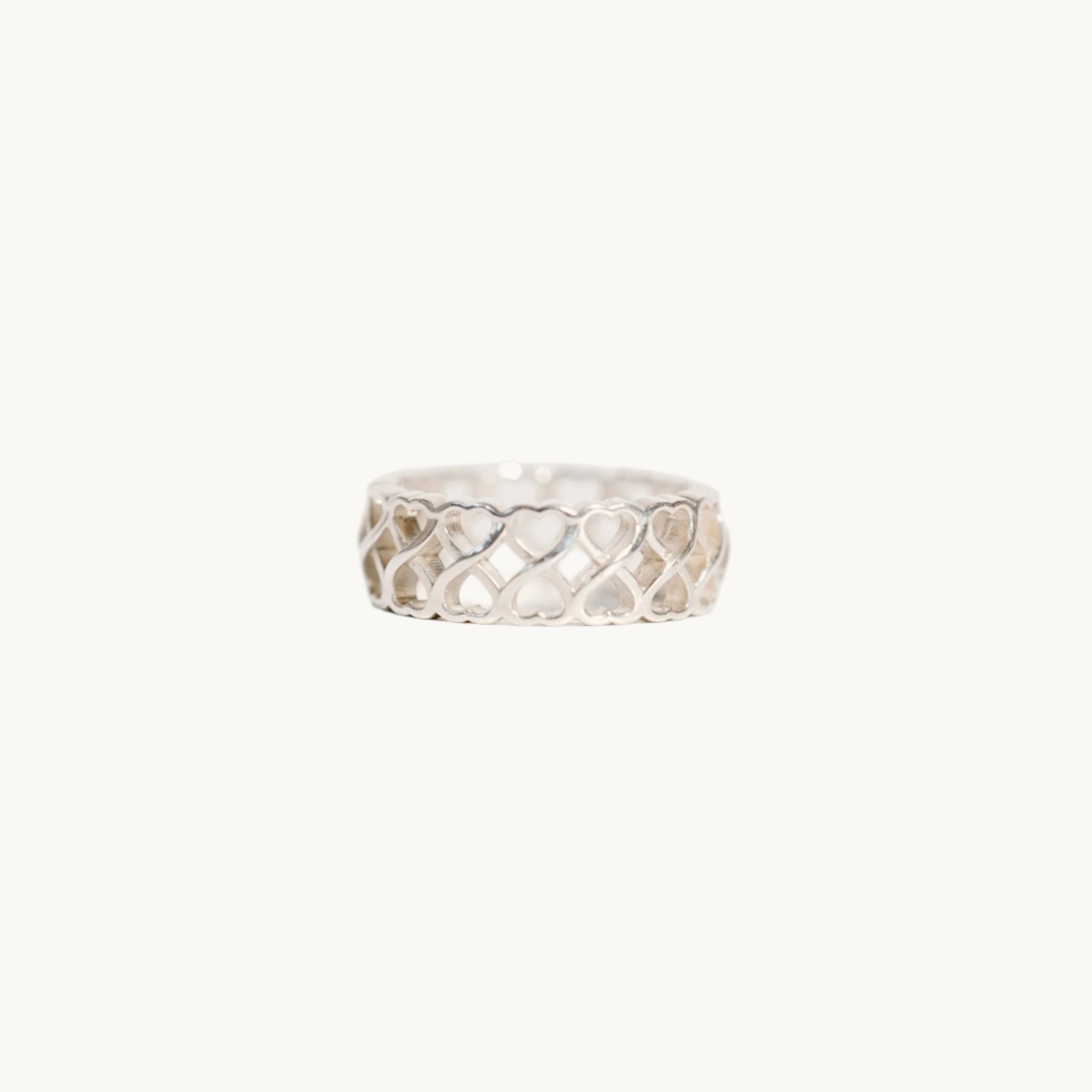 Infinite hearts ring on white background.