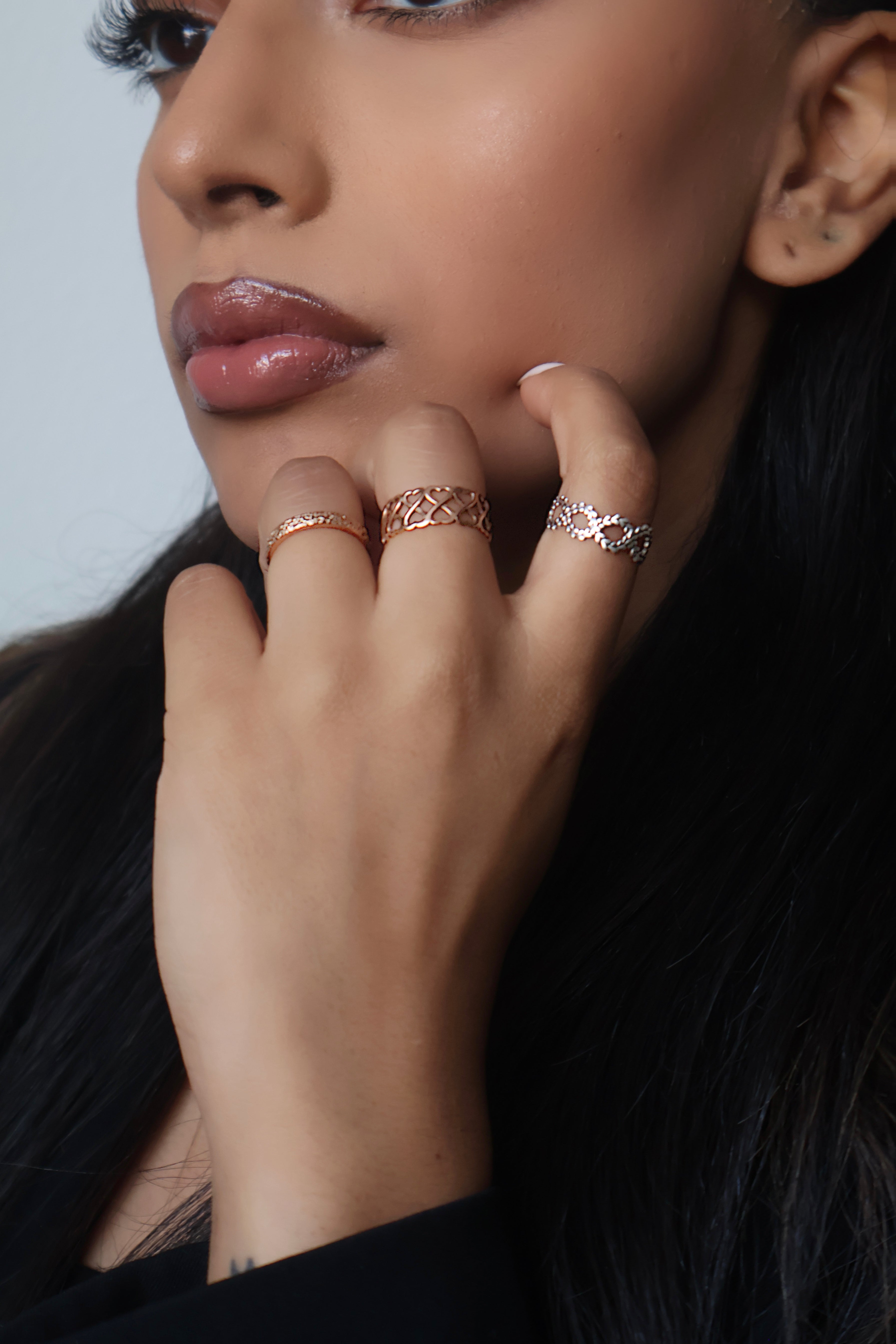 Love rings elegantly modelled by south asain women.