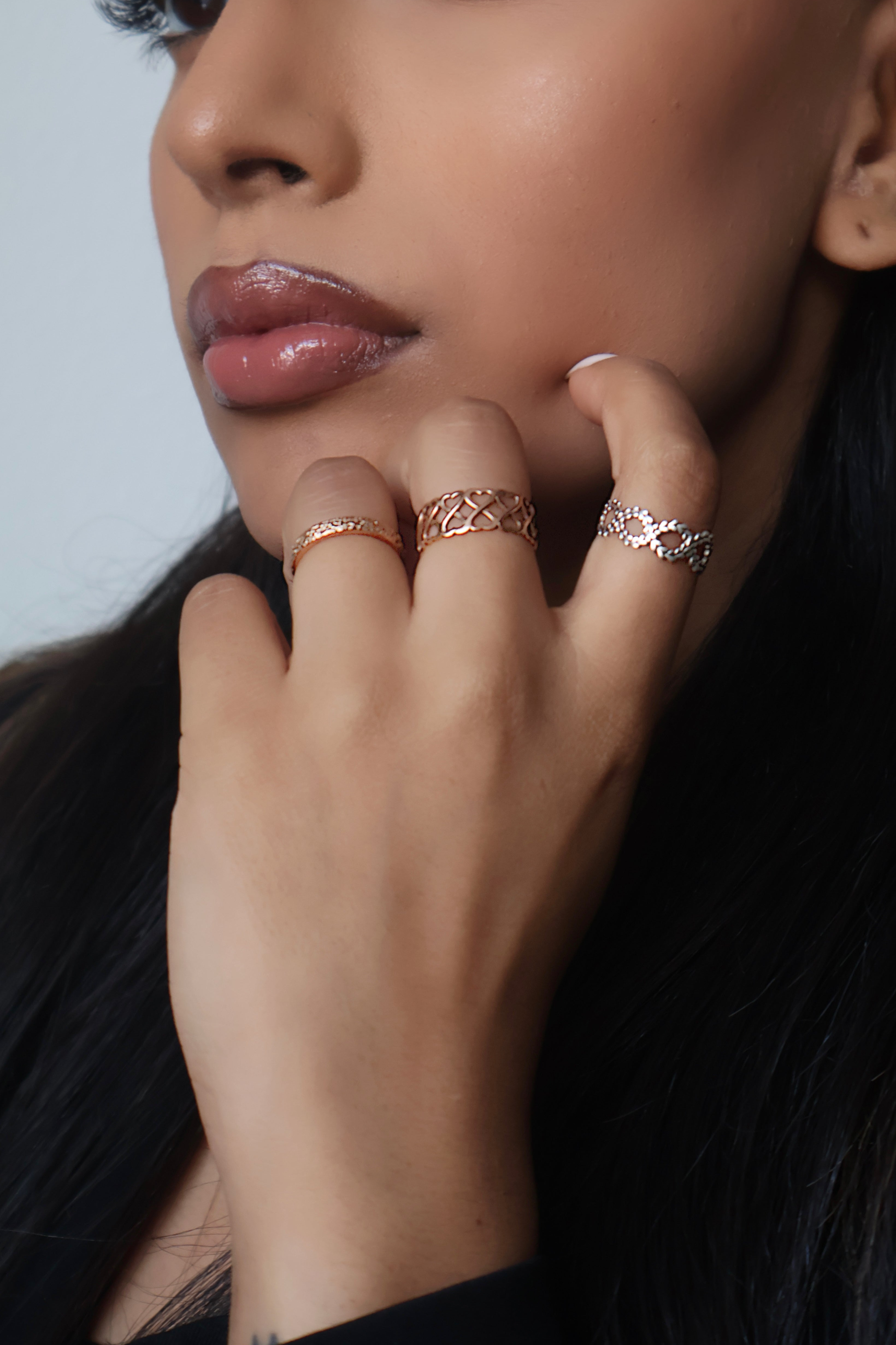 Love rings on South Asian model.