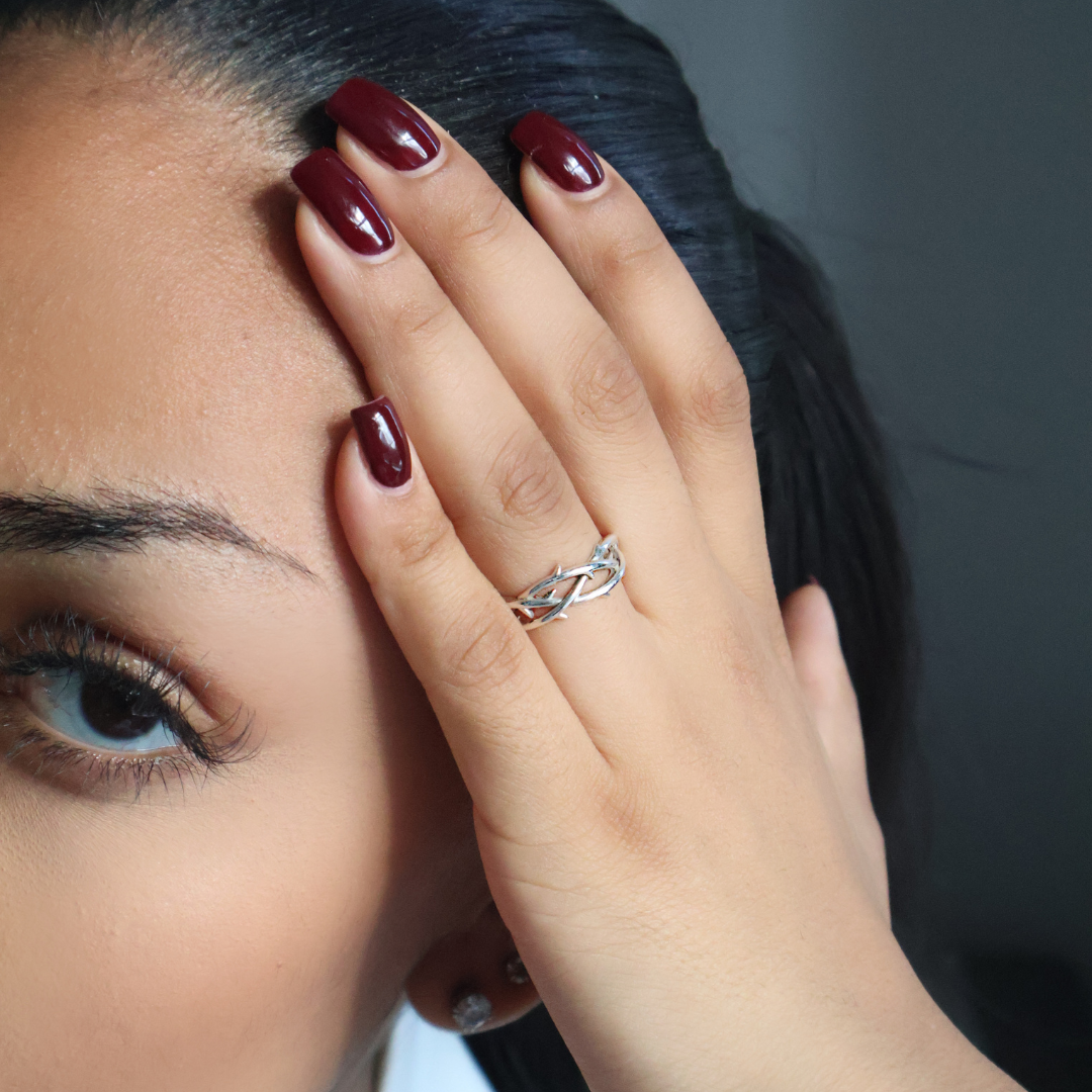 woman wearing silver ring